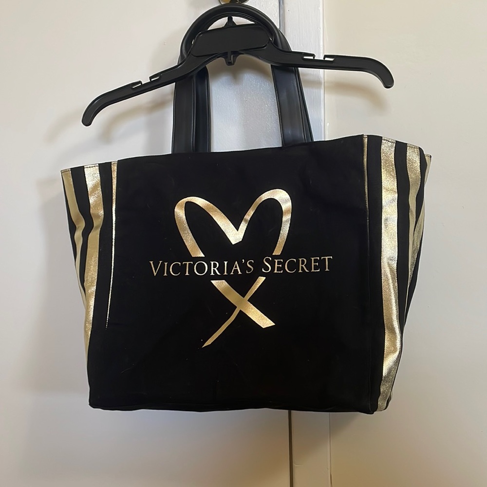 Victoria’s Secret gold and black bag